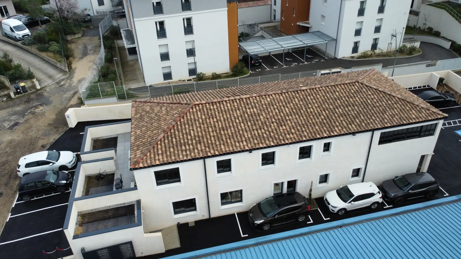 Toiture en tuiles réalisé par BatiPro Construction
